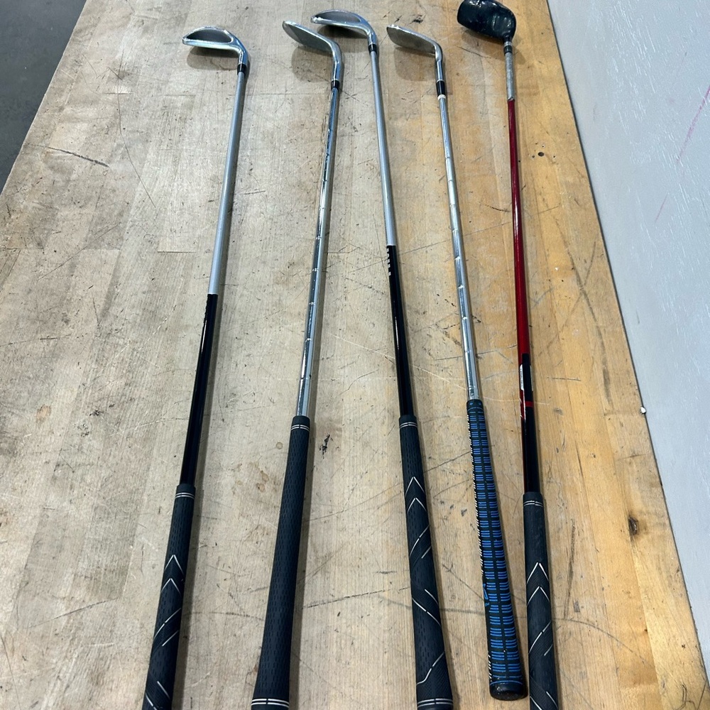 5 golf clubs